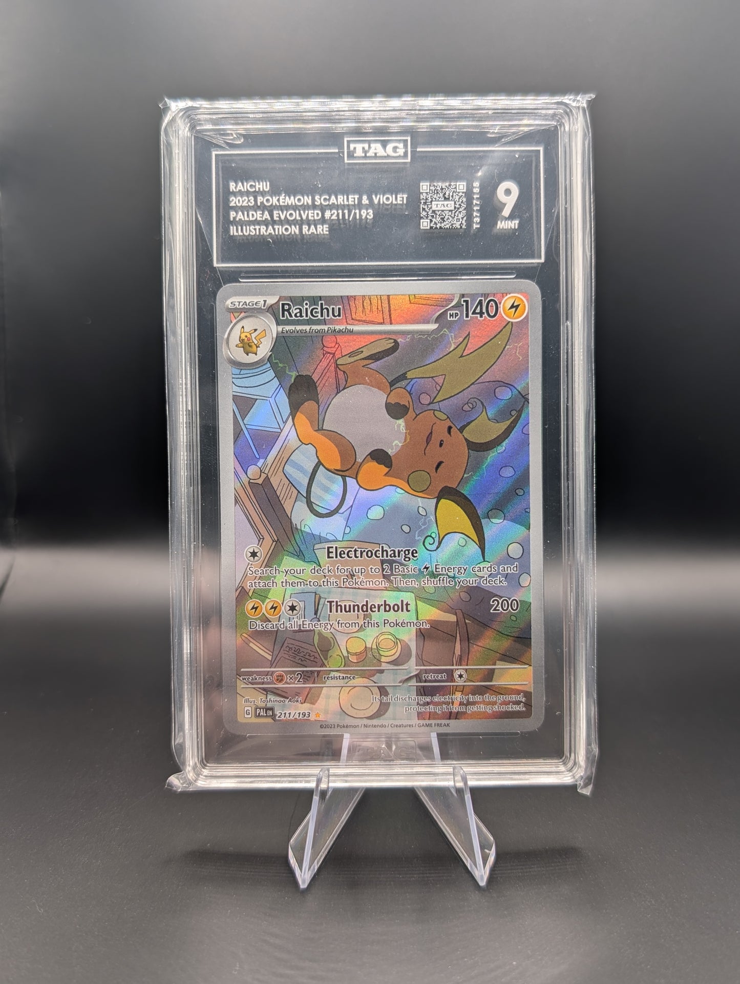Raichu - Paldea Evolved #211/913 - TAG Mint 9